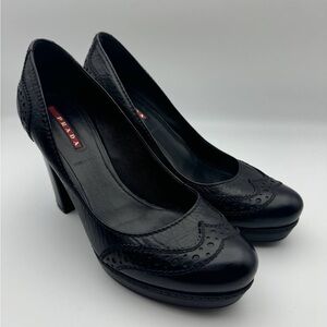 PRADA BLACK PATENT LEATHER BROGUE DESIGN HEELS SIZE 38.5